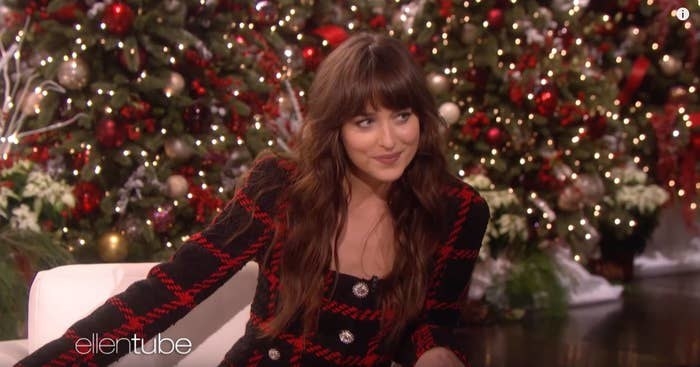 Dakota Johnson sitting down for an interview with Ellen DeGeneres with a look on her face that says &quot;right?&quot;