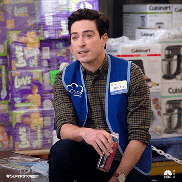 Jonah from Superstore closing his eyes in exhaustion