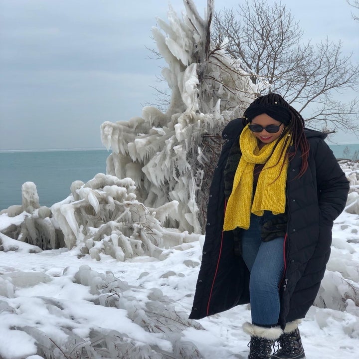 a reviewer in the coat in black