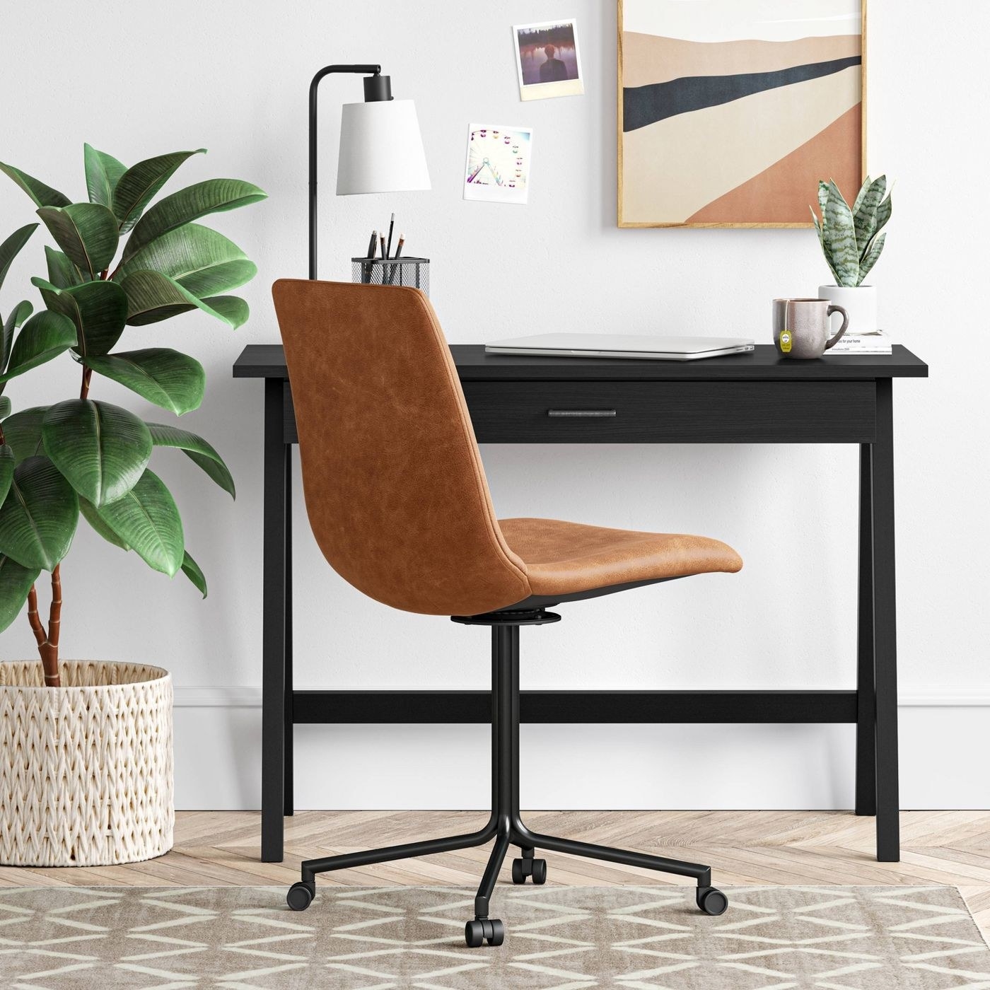 the medium brown leather chair in front of a desk