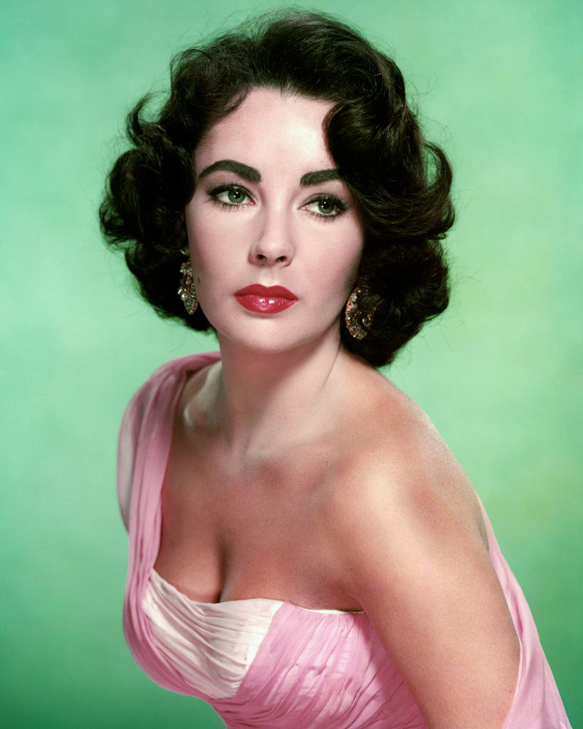 Taylor posing for a portrait in 1960