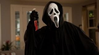Ghostface holding a bloody knife