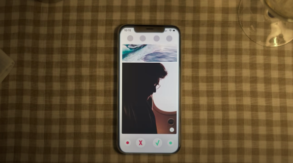 An iphone with the sillohouette of a man