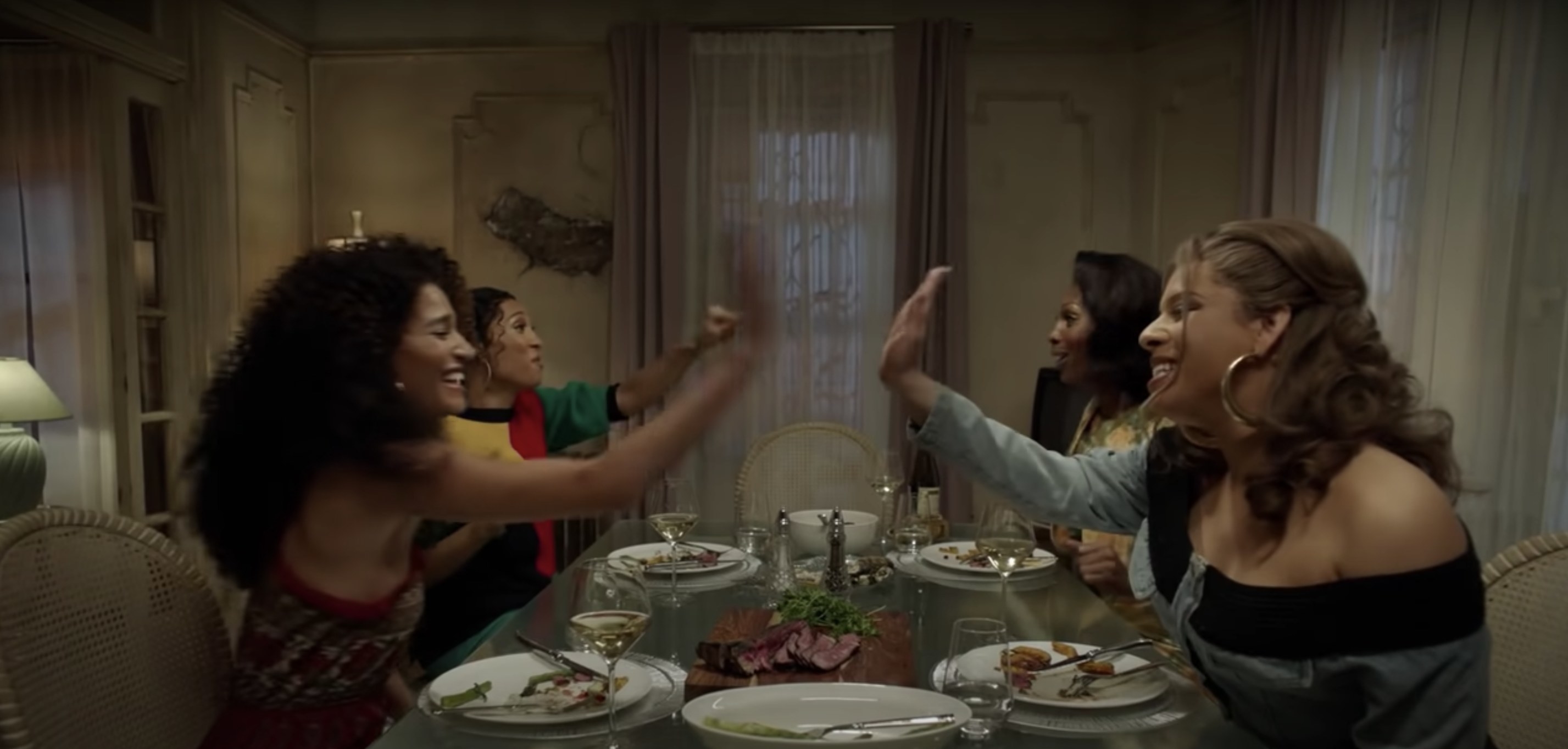 The women of FX Pose eat dinner together