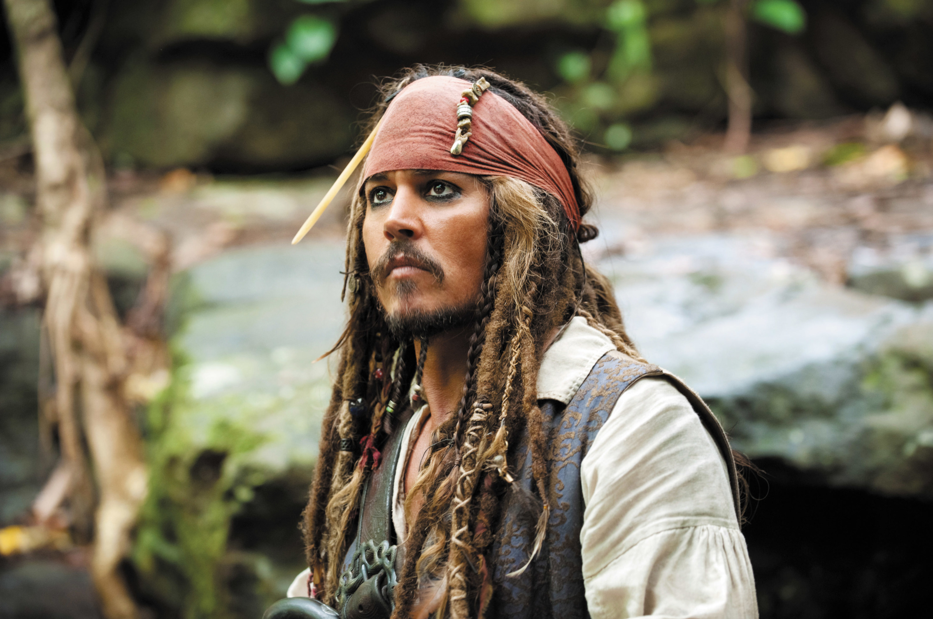 Depp looks upwards as Sparrow