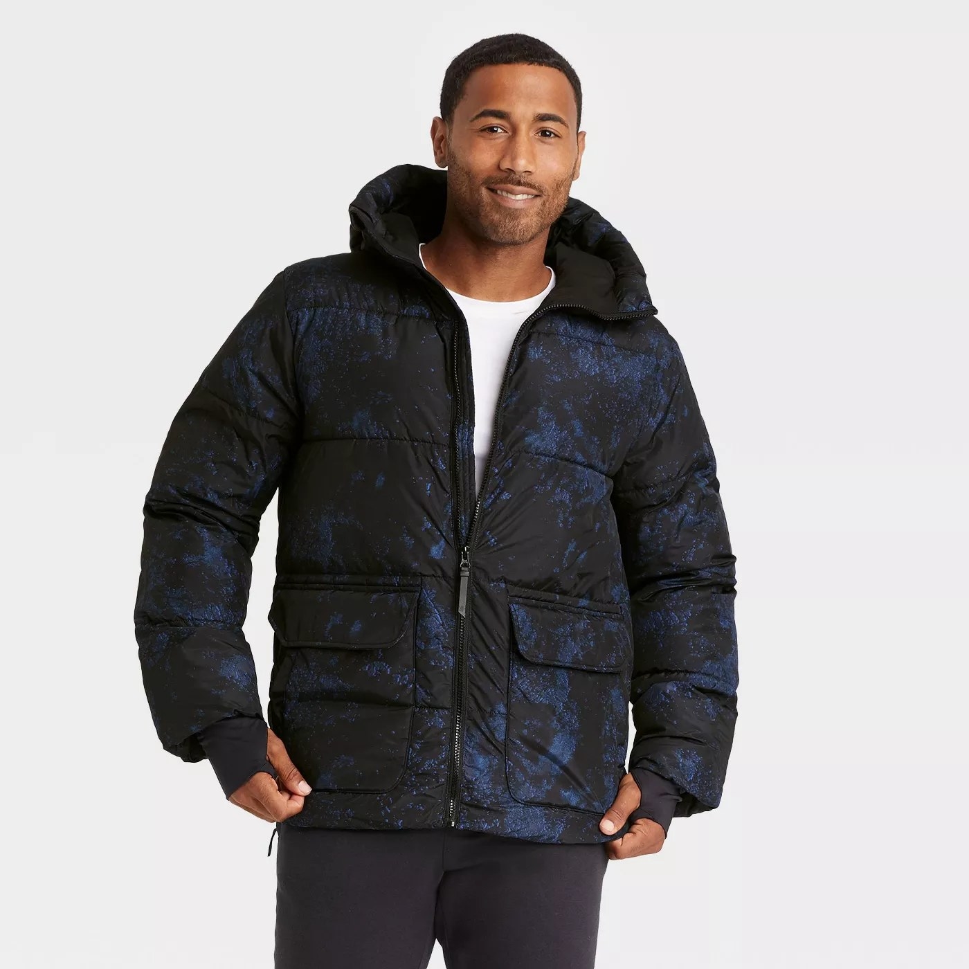 A blue and black puffer jacket