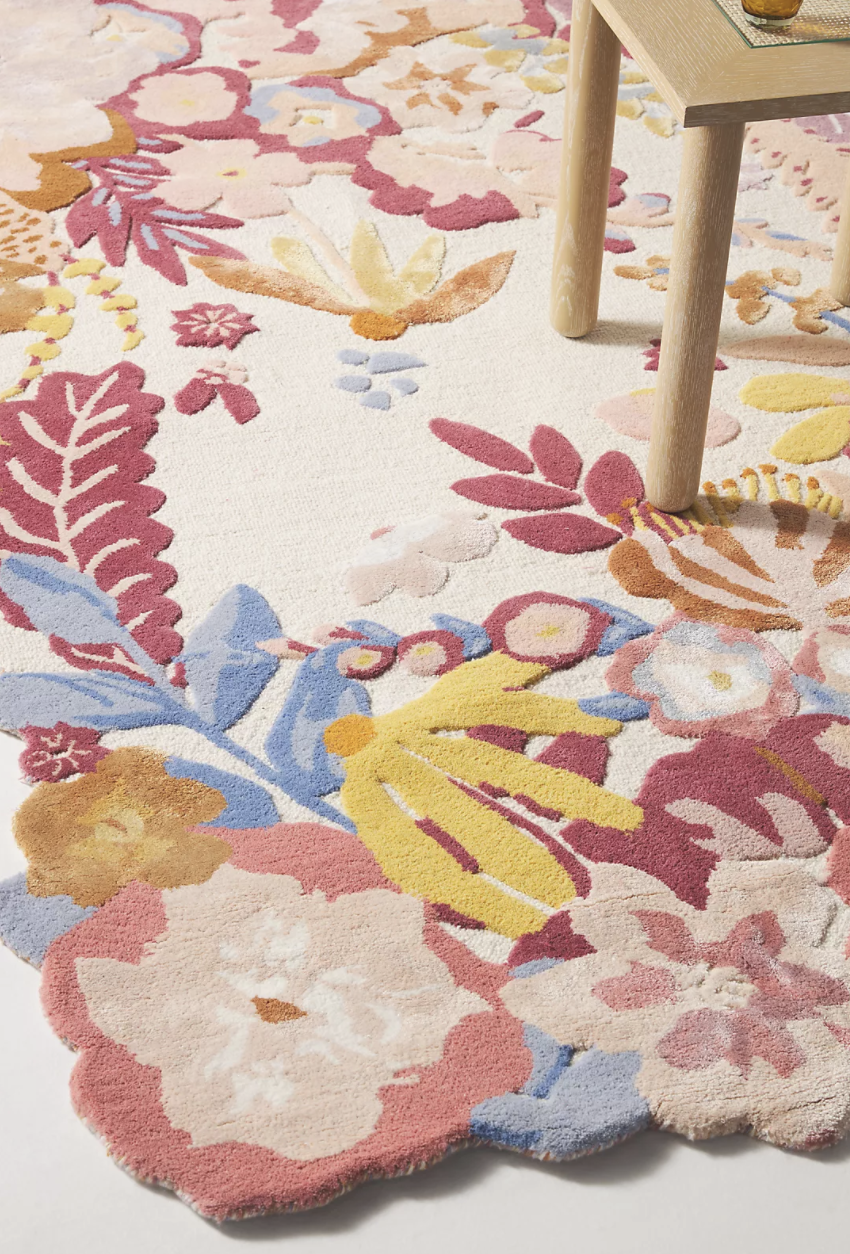an irregular-shaped floral rug