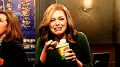 Emma Stone crying and shoveling ice cream into her mouth
