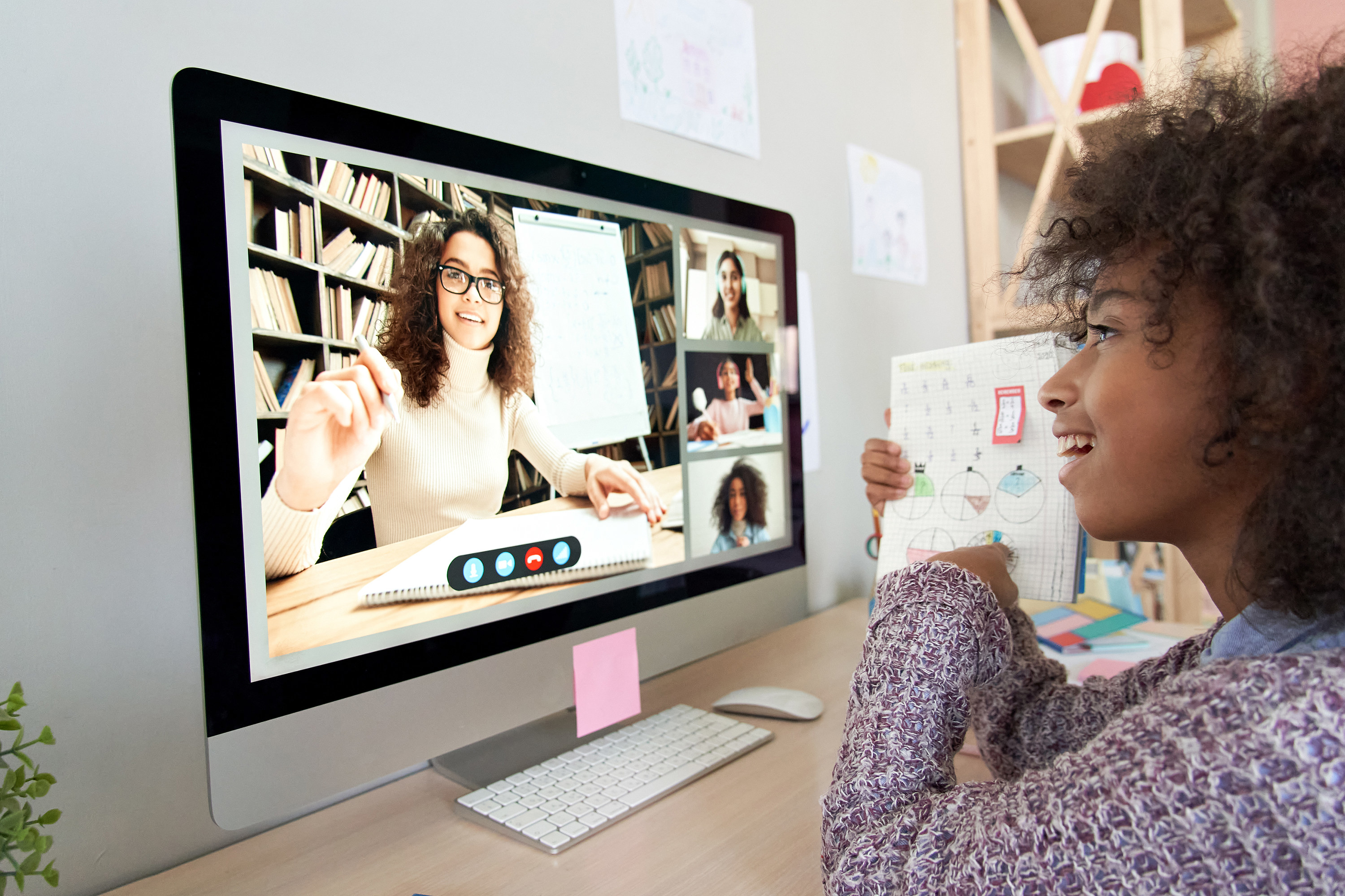 Young girl talks with an online tutor