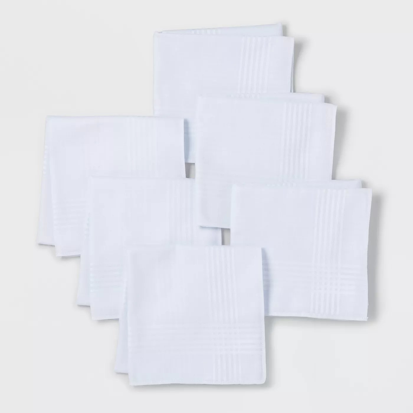 Six white handkerchiefs