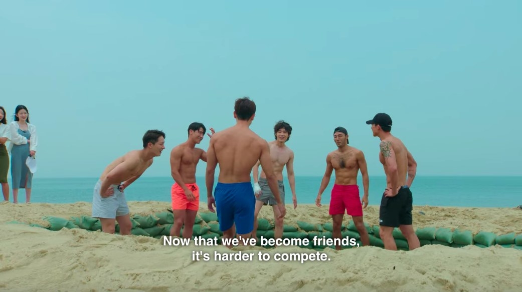 The men stand in the mud pool and say that now that they&#x27;ve become friends, it&#x27;s harder to compete