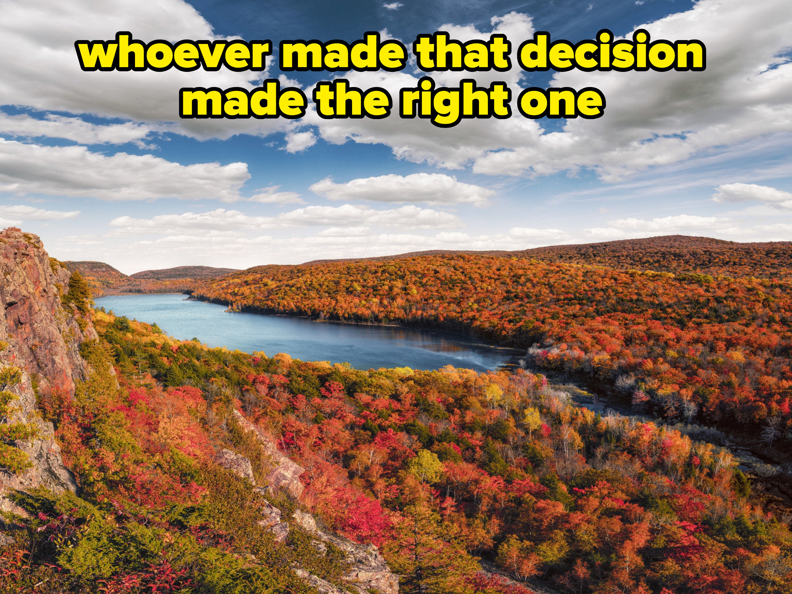 a bunch of fall foliage around a river, with caption: whoever made that decision made the right one