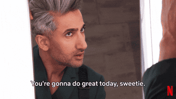 A gif of Tan France saying &quot;You&#x27;re gonna do great today, sweetie&quot; while looking in the mirror