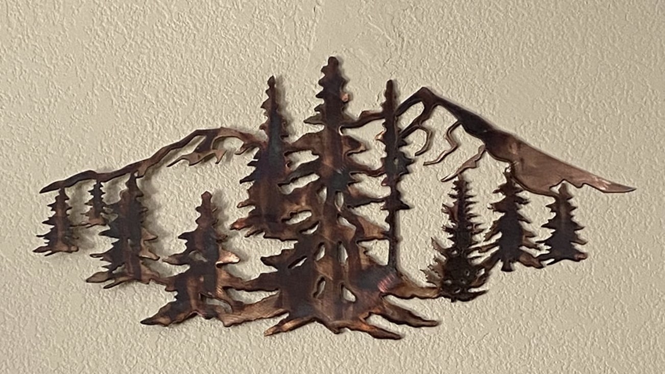 Reviewer&#x27;s photo of the metal wall art