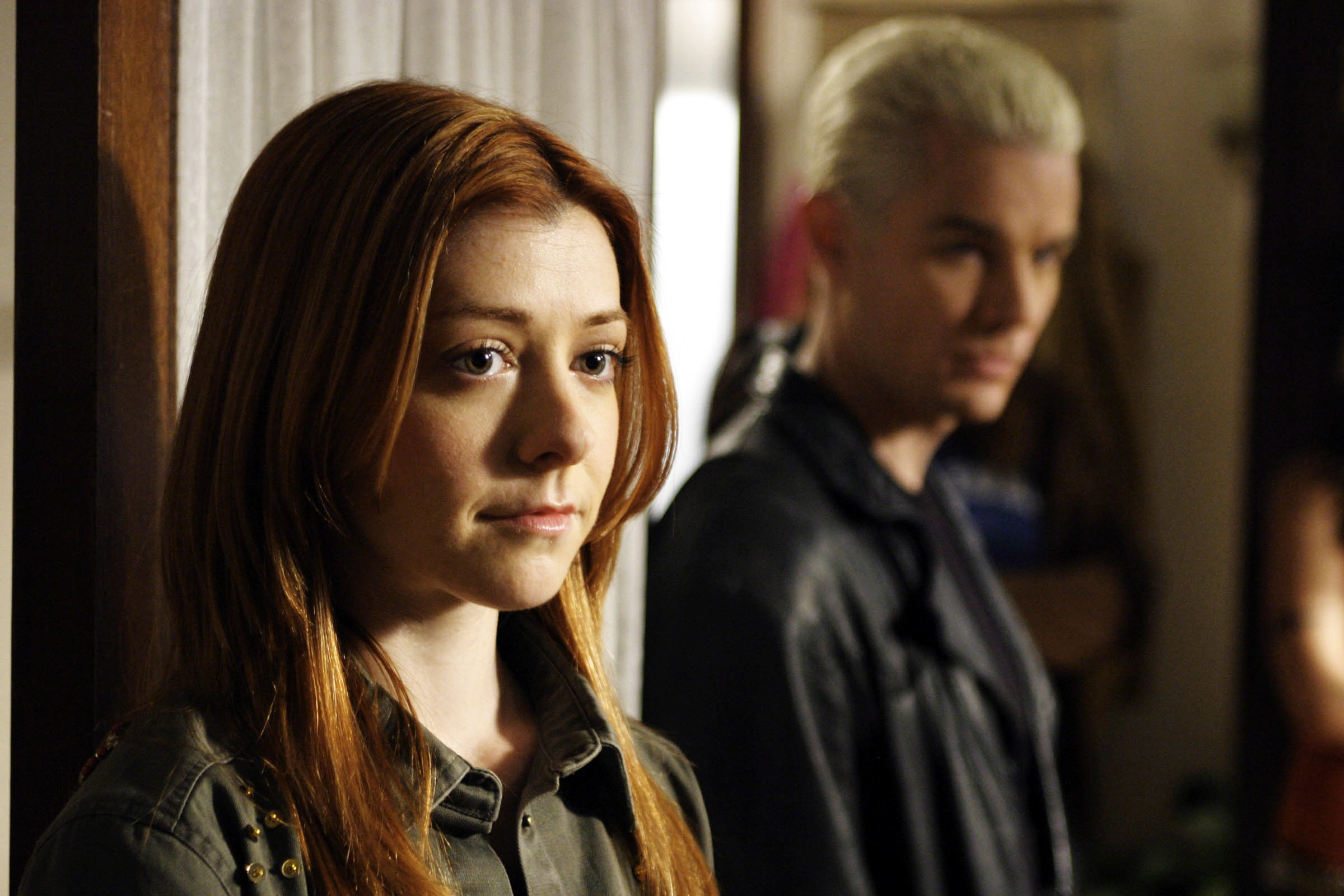 Willow standing next to Spike in the series finale