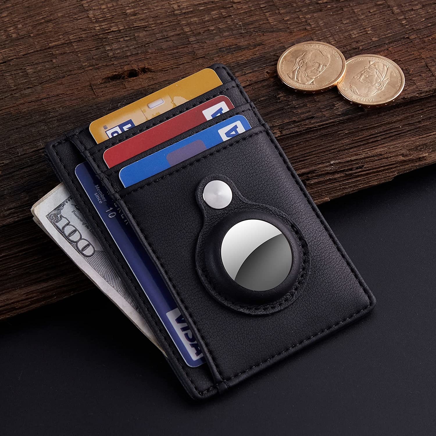 The AirTag wallet on a table with cards and an AirTag inside