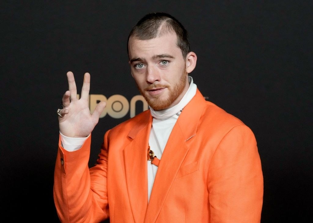 Angus Cloud in an orange suit