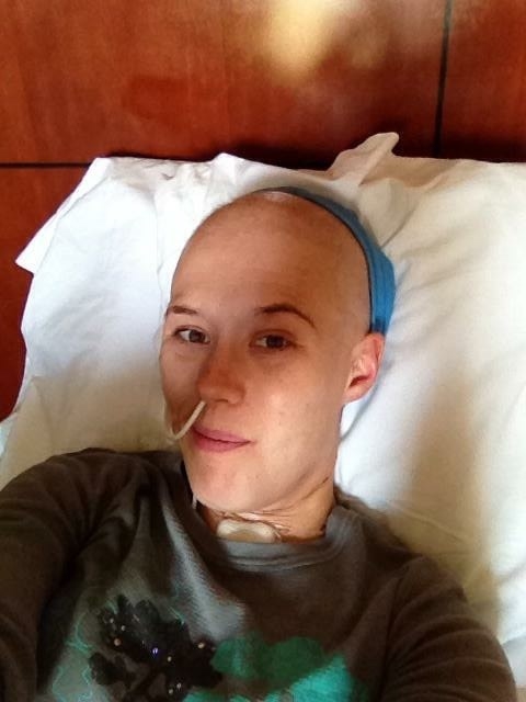 Cameron in bed receiving oxygen