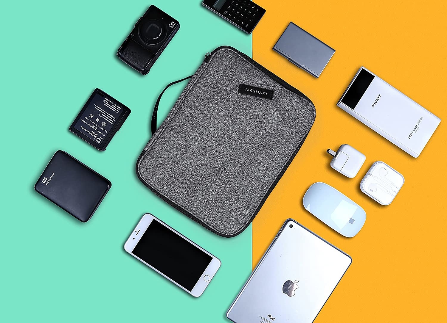 A small rectangular fabric case surrounded by devices and tech accessories