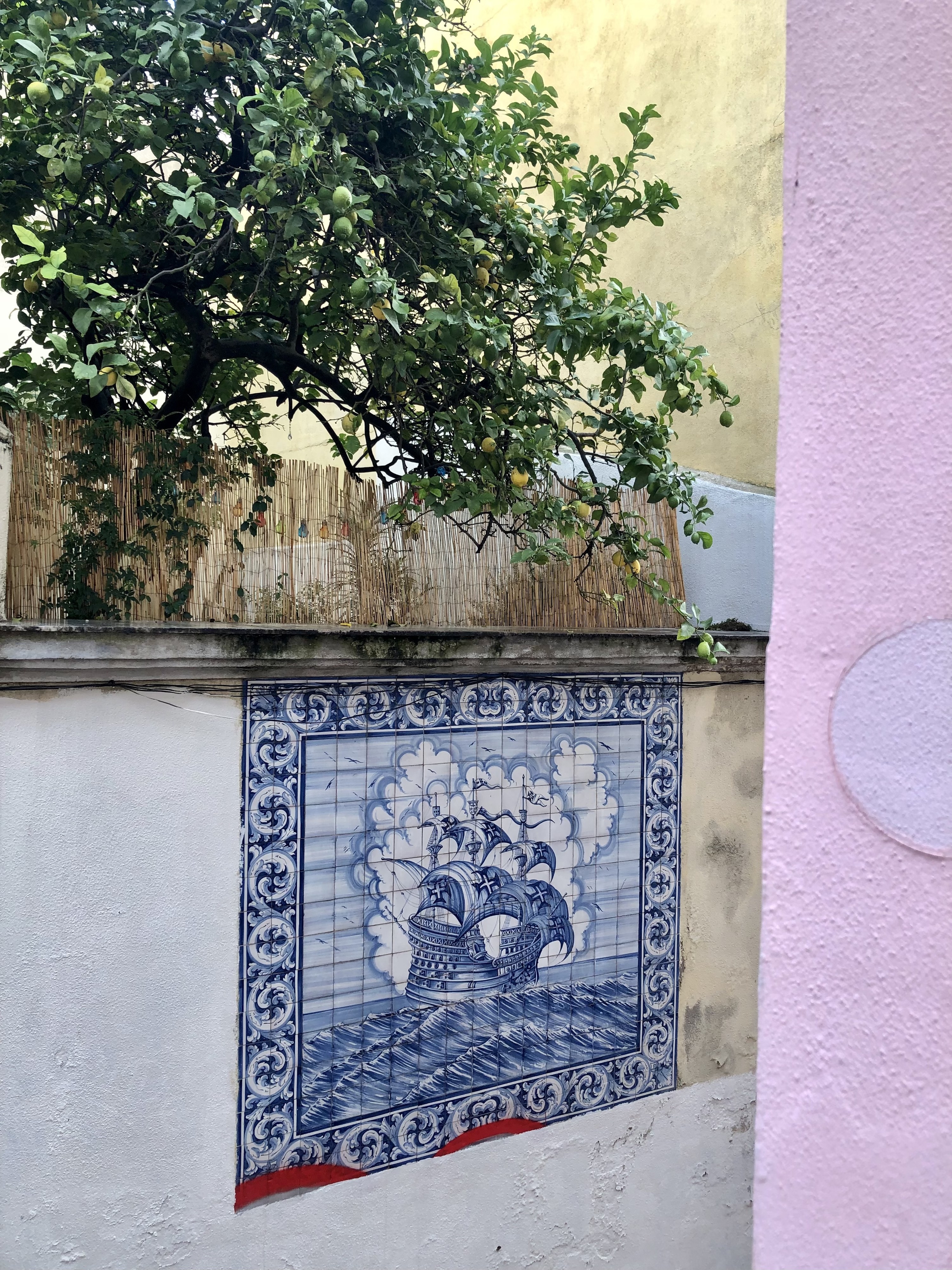 Street art in Lisbon mimicking tiles.