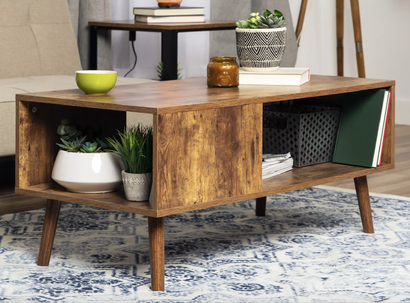 The wooden coffee table with open shelving