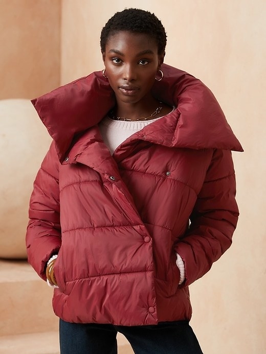 Model wearing red puffer coat