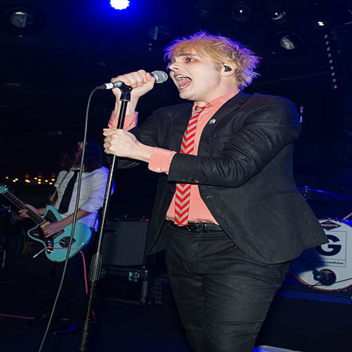 shot of MCR frontman Gerard Way performing onstage