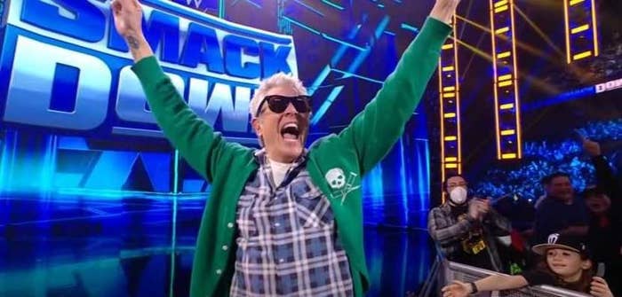 Johnny Knoxville celebrates on WWE Smackdown stage