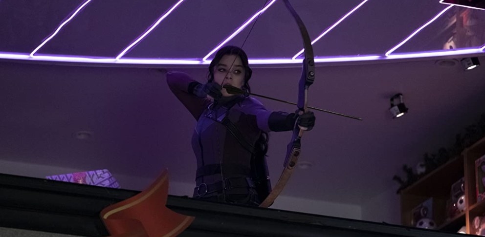 kate bishop holds a bow and arrow