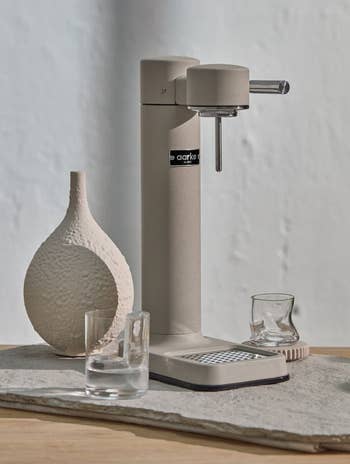 The Aarke sparkling water maker in Sand