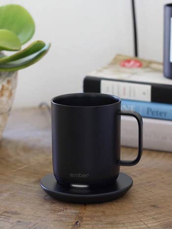 photo of black Ember mug filled with coffee