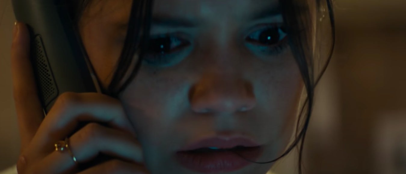 Tara holding the phone up to her ear in &quot;Scream&quot; (2022)