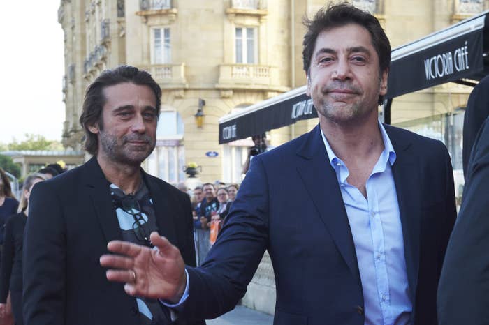 Javier stands next to Jordi at an event