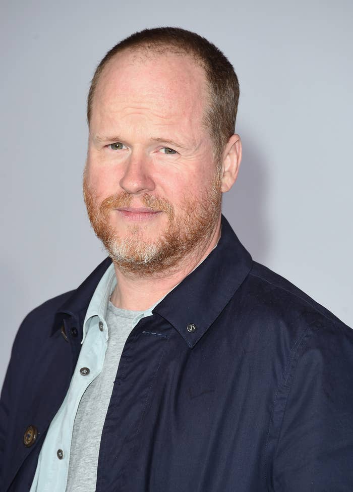 Whedon smiles at an event