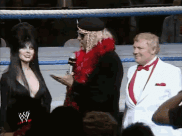 Elvira speaking ringside at WWE event