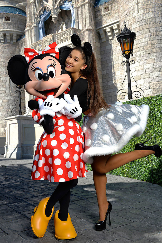 wearing mouse ears of her own, the singer posed with Minnie Mouse