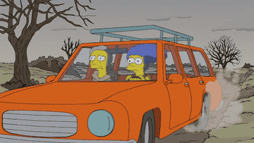 Marge and Homer drive their car