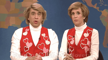 Fred Armisen and Kristin Wiig in matching Valentine&#x27;s Day vests singing &quot;February 14th is for lovers&quot;