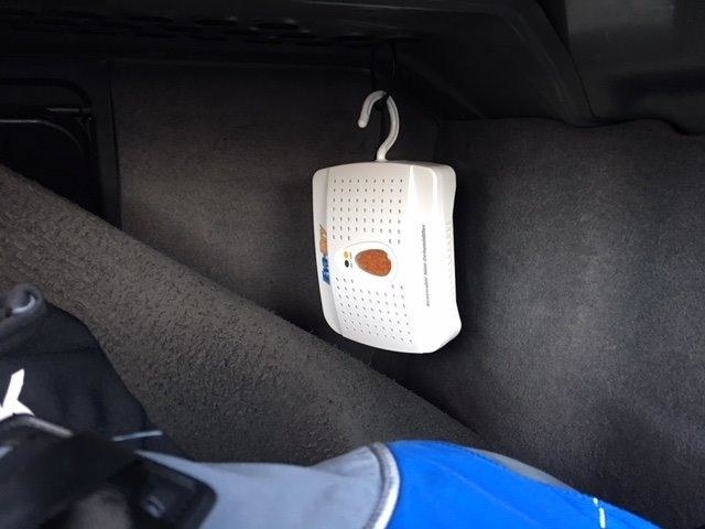 Reviewer photo of the dehumidifier in the trunk of their car