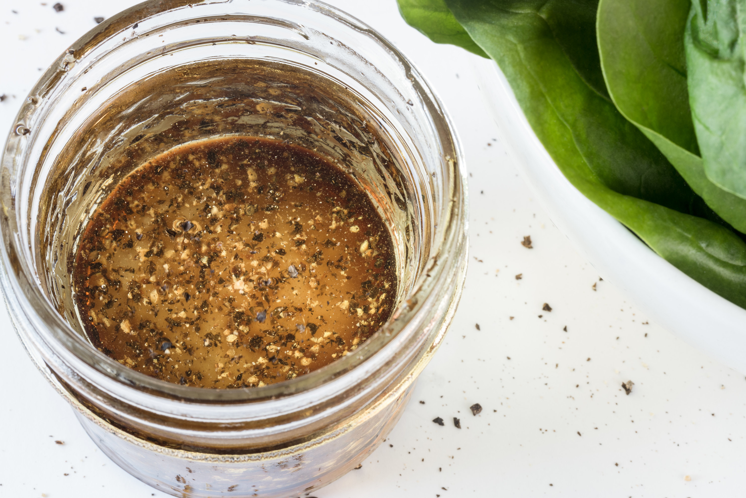 Peppery dressing in a Mason jar