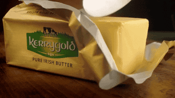 Cutting into a slice of Kerrygold butter