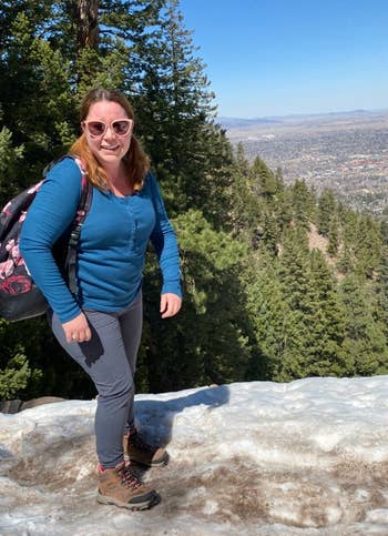 Reviewer is wearing greyfleece-lined leggings while on a hike