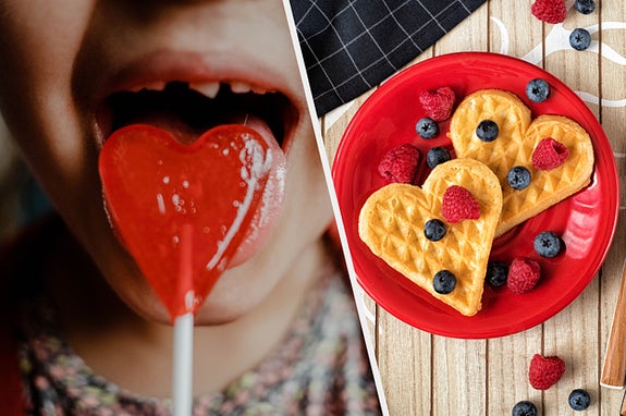 A small child licks a heart lollipop and an overhead shot of heart shaped waffles with berries on top