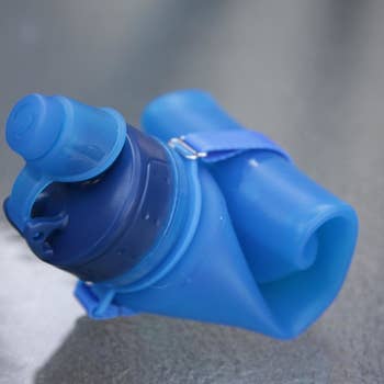 a reviewer photo of the water bottle rolled up