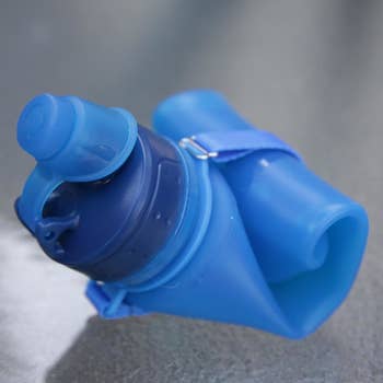 a reviewer photo of the water bottle rolled up
