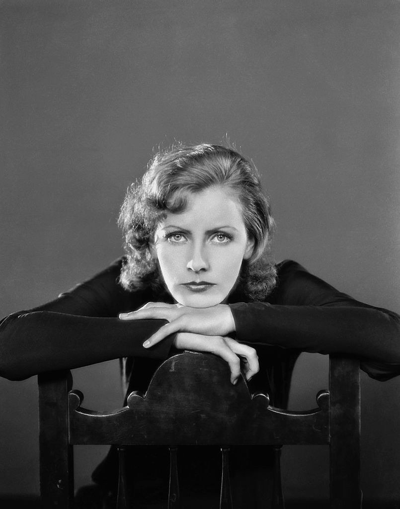 Greta Garbo posing for a photo while wearing all black