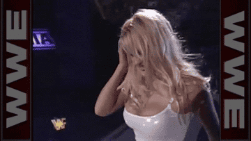 Pamela Anderson walks out with Kevin Nash