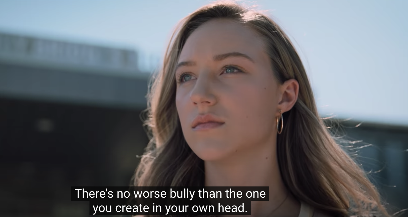 Jodi looking off into the sky with the caption