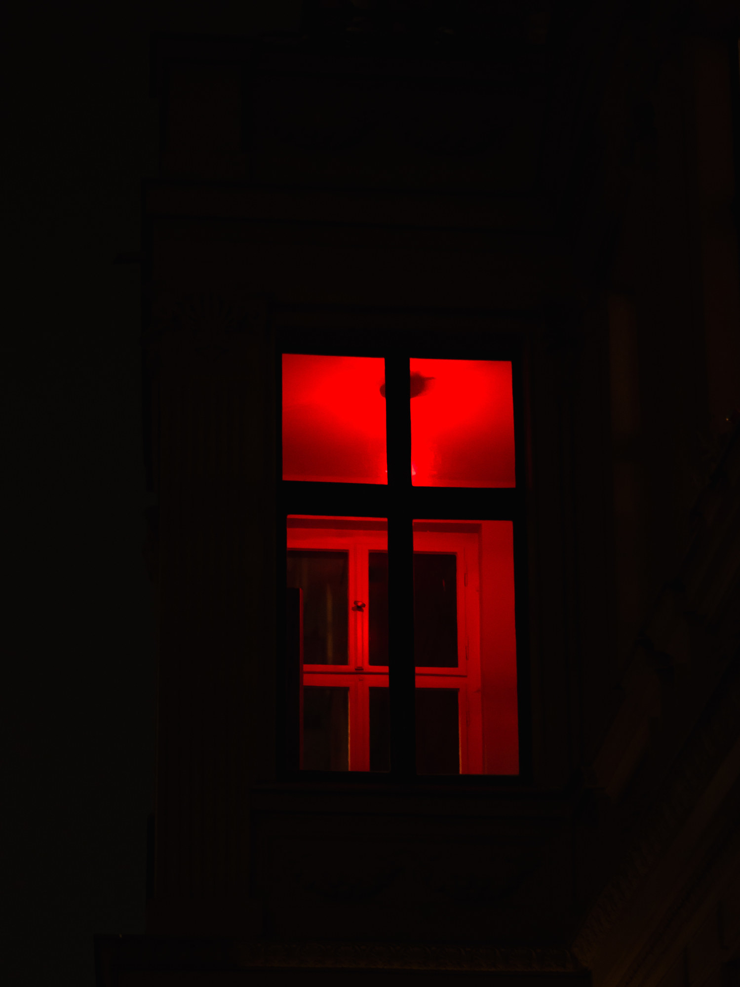 A room glows red at night
