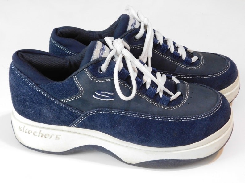 Navy blue Skechers platform sneakers